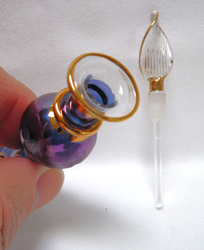 MINIATURE EGYPTIAN PERFUME BOTTLE: 'Nefertitis Tears 18 K gold glided, amethyst toned, mouth blown, hand-cut'