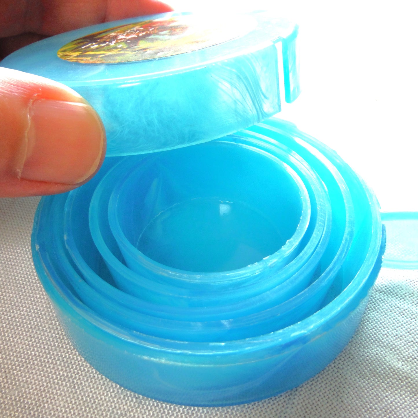 Vintage Portable Collapsing Travel Mug in Turquoise Blue: ROYAL CANADIAN MOUNTED POLICE, by "Collaps-A-Mug" of Hong Kong