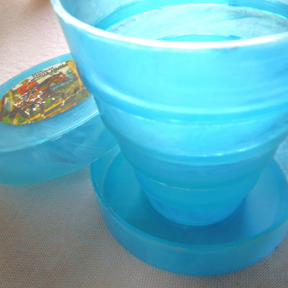 Vintage Portable Collapsing Travel Mug in Turquoise Blue: ROYAL CANADIAN MOUNTED POLICE, by "Collaps-A-Mug" of Hong Kong