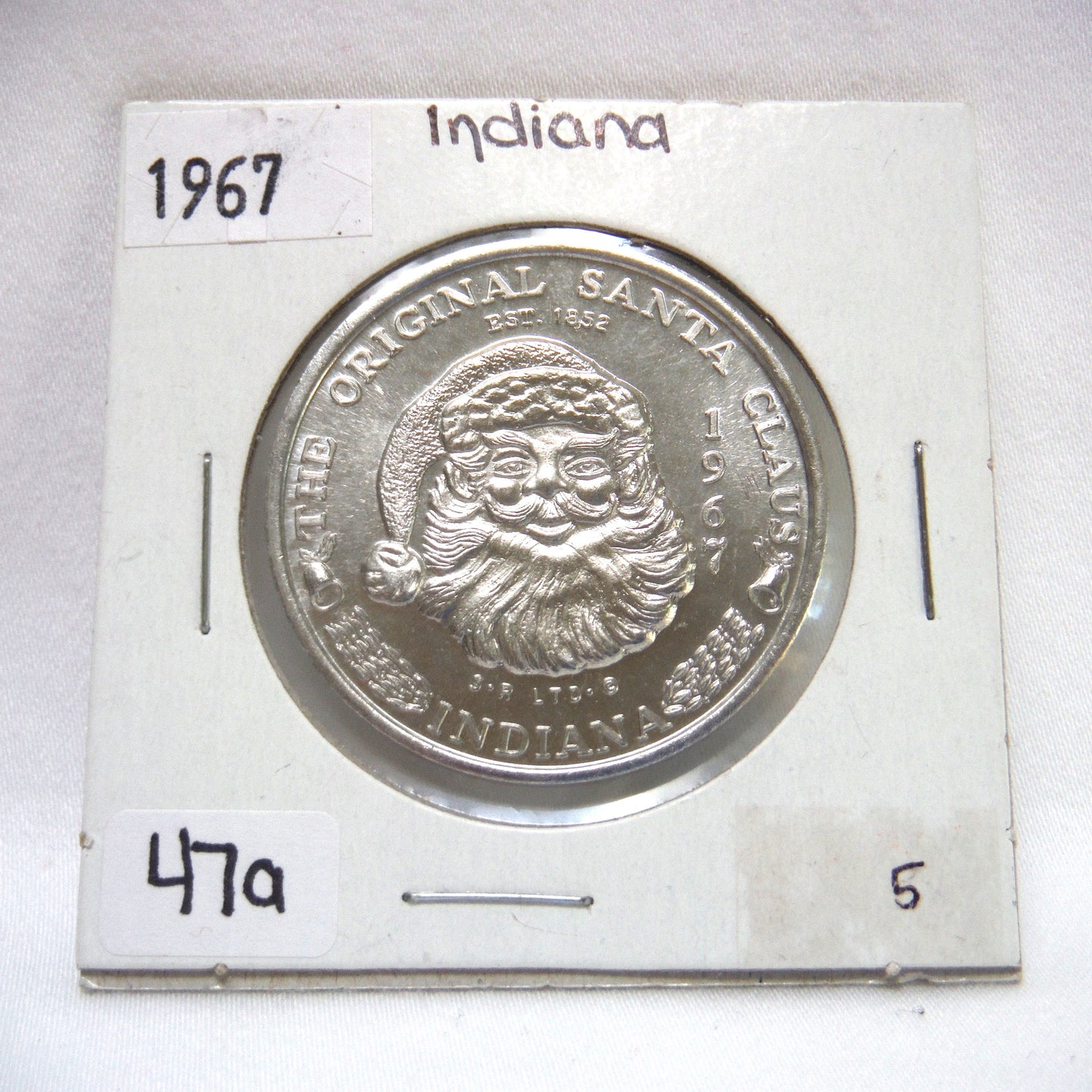 1967 THE ORIGINAL SANTA CLAUS TOKEN, From Indiana, USA. Condition is Excellent, Brilliant, Uncirculated, in original 2x2 display holder