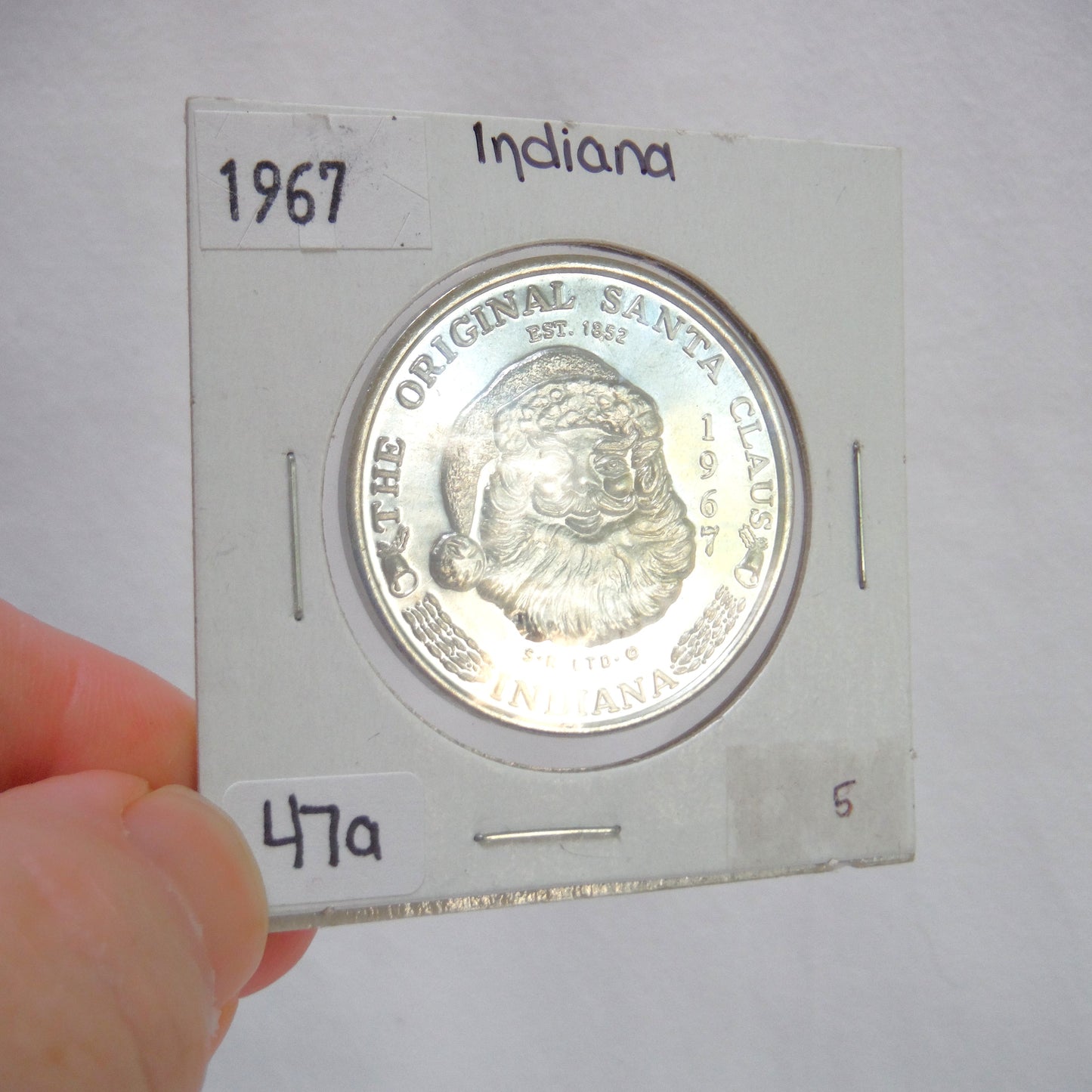 1967 THE ORIGINAL SANTA CLAUS TOKEN, From Indiana, USA. Condition is Excellent, Brilliant, Uncirculated, in original 2x2 display holder