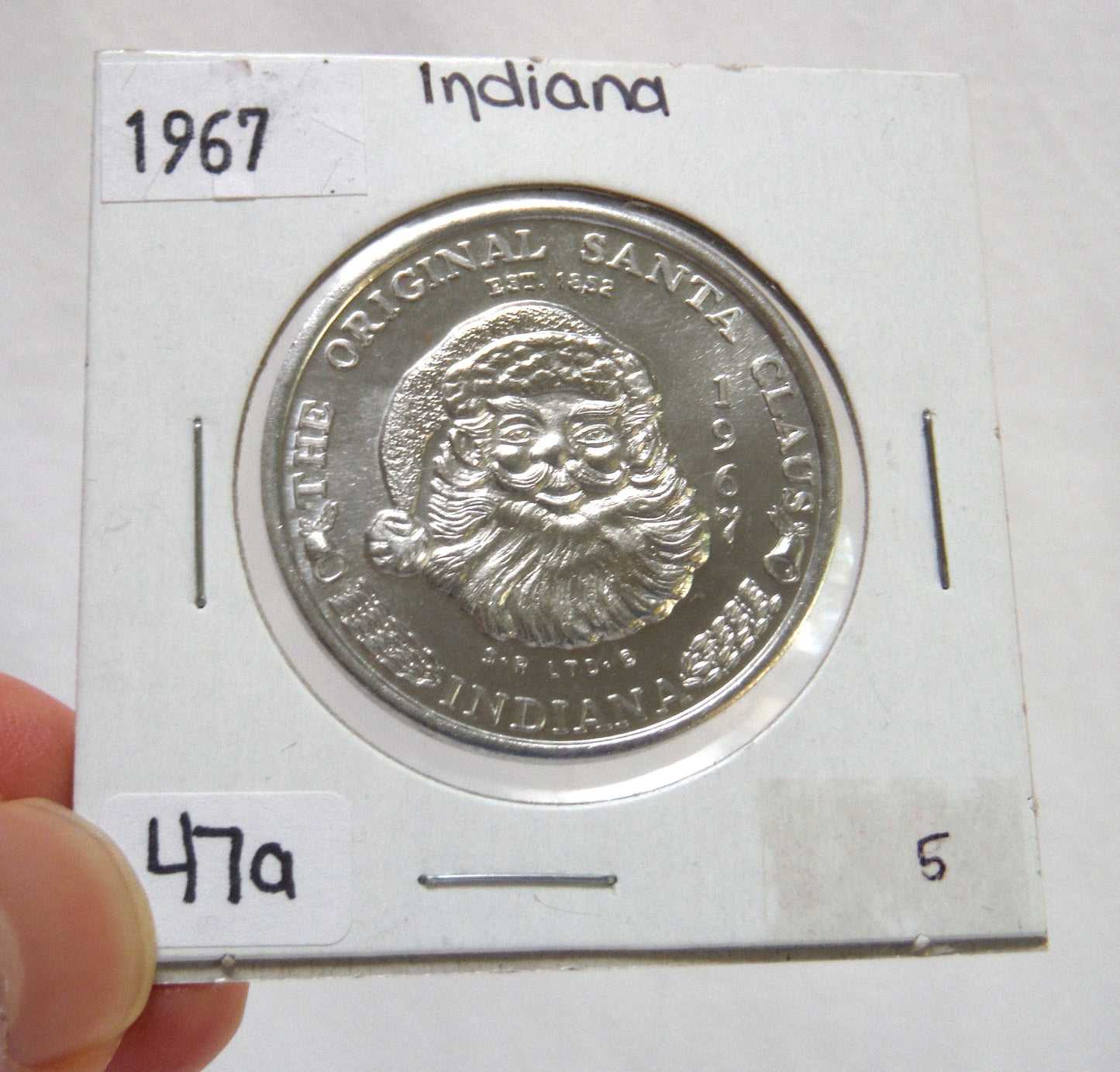 1967 THE ORIGINAL SANTA CLAUS TOKEN, From Indiana, USA. Condition is Excellent, Brilliant, Uncirculated, in original 2x2 display holder