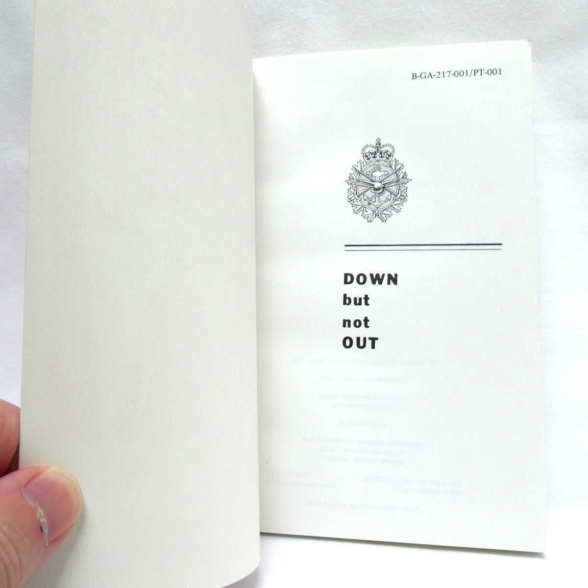 DOWN BUT NOT OUT, A Survival Guide by The Canadian Department of National Defence, Canada, 1984