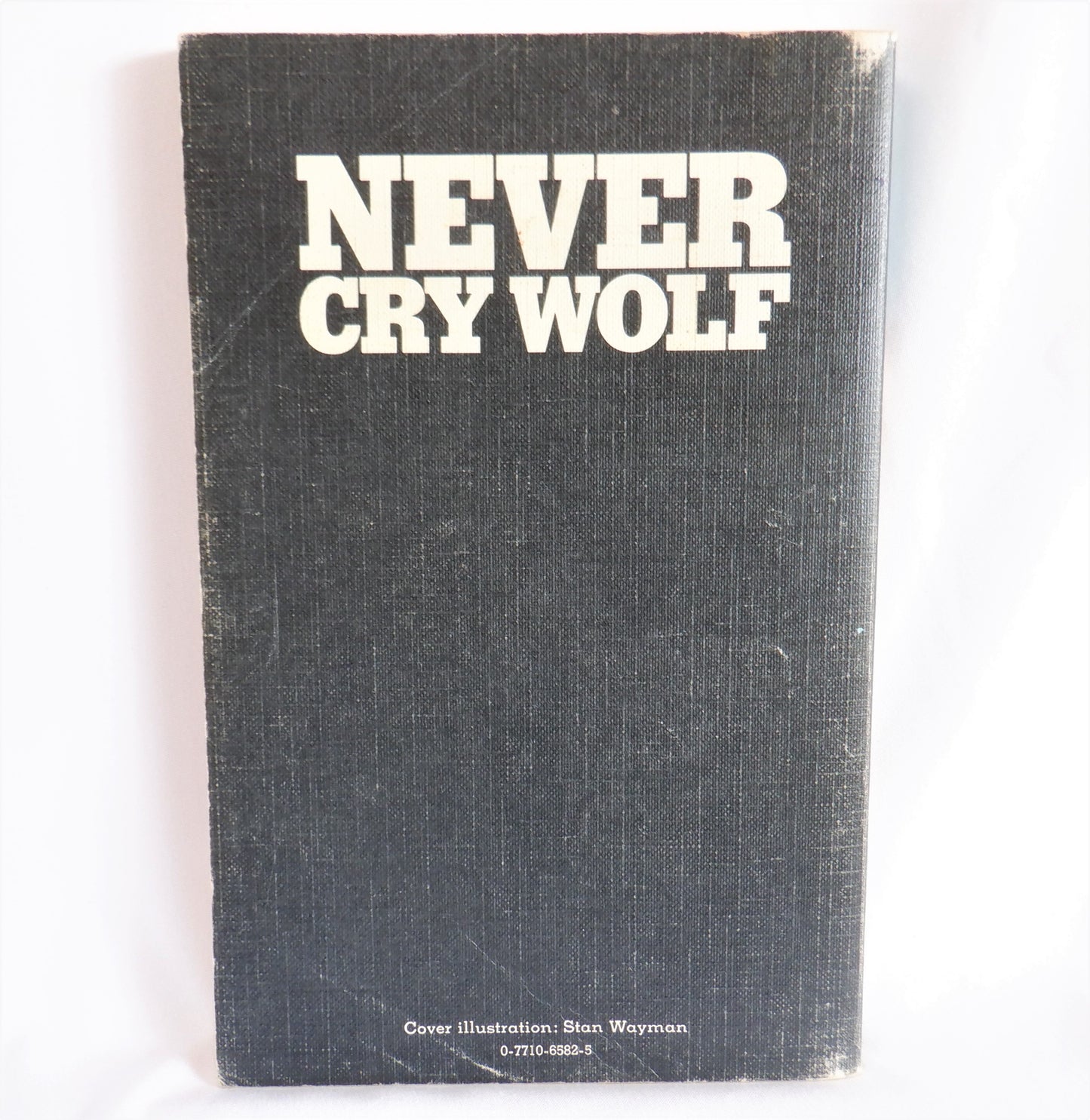 NEVER CRY WOLF, A True Arctic Adventure Story by Farley Mowat, 1973