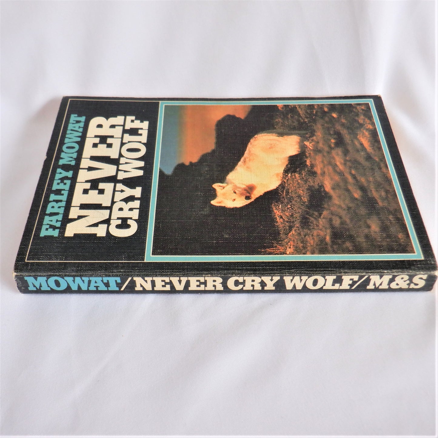 NEVER CRY WOLF, A True Arctic Adventure Story by Farley Mowat, 1973